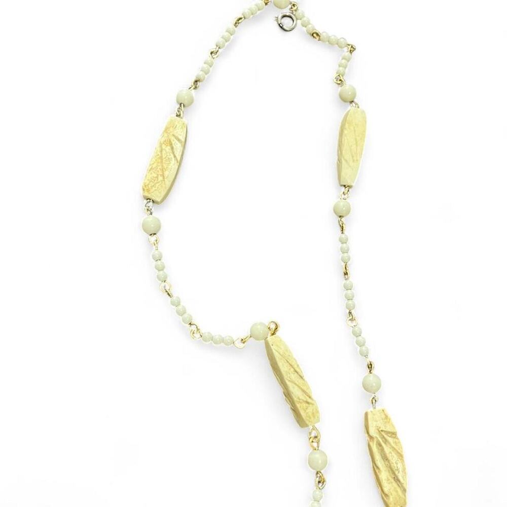 White and cream beaded necklace